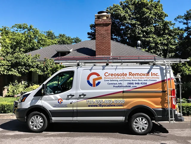 Cromwell Chimney Sweep technician removing creosote safely in Cromwell, CT